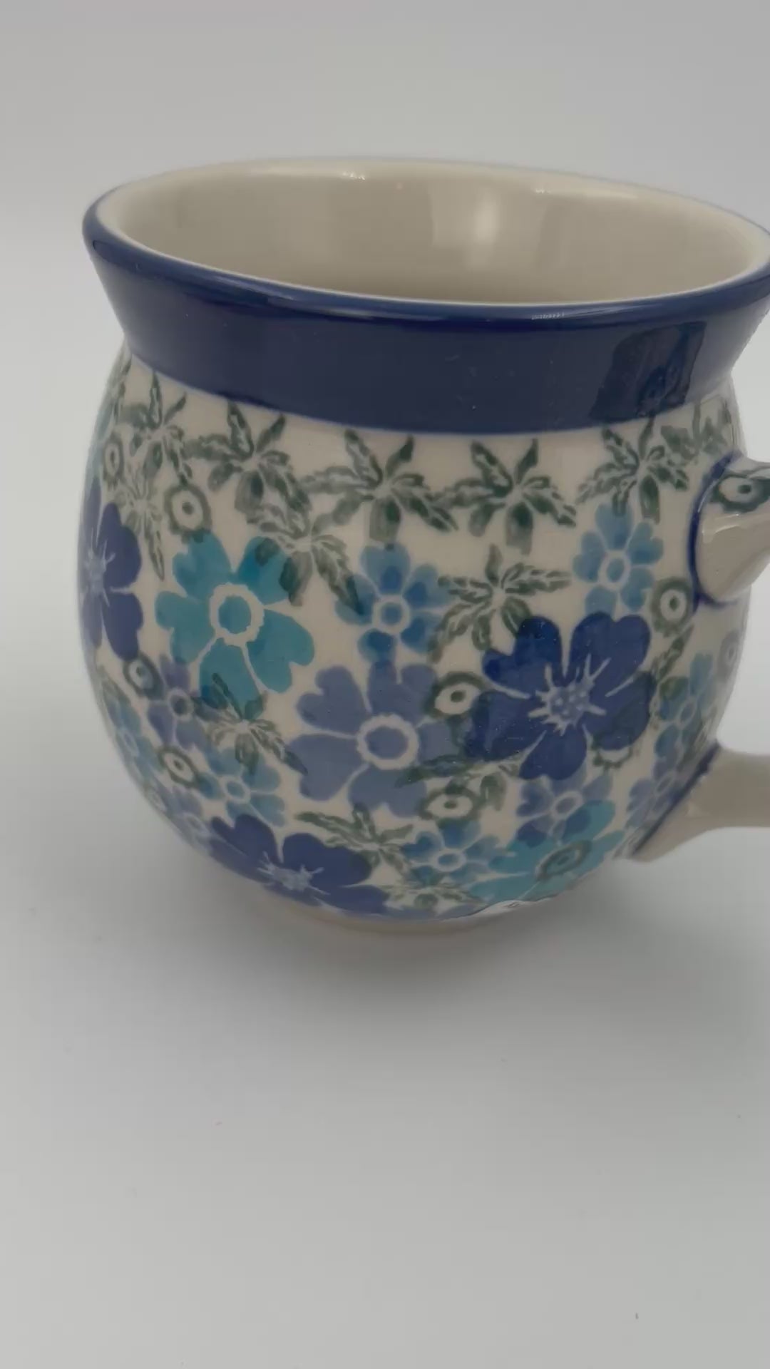 12 oz Polish Pottery UNIKAT bubble mug is made by talented artisans from Poland UNIKAT Fields of Blue Design. Ceramika Artystyczna Company