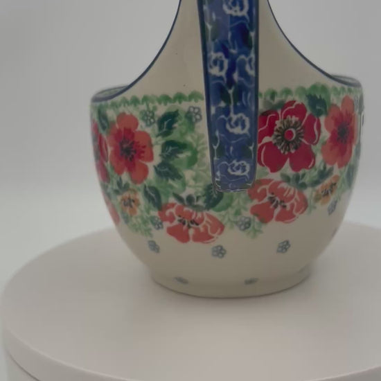 Polish pottery 16oz bowl with loop handle in the UNIKAT Candy Red Poppy pattern. It holds 16 oz of fluid.
Ceramika Artystyczna Company