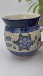 16 oz blue floral Polish Pottery bubble mug is made by talented artisans from Poland.